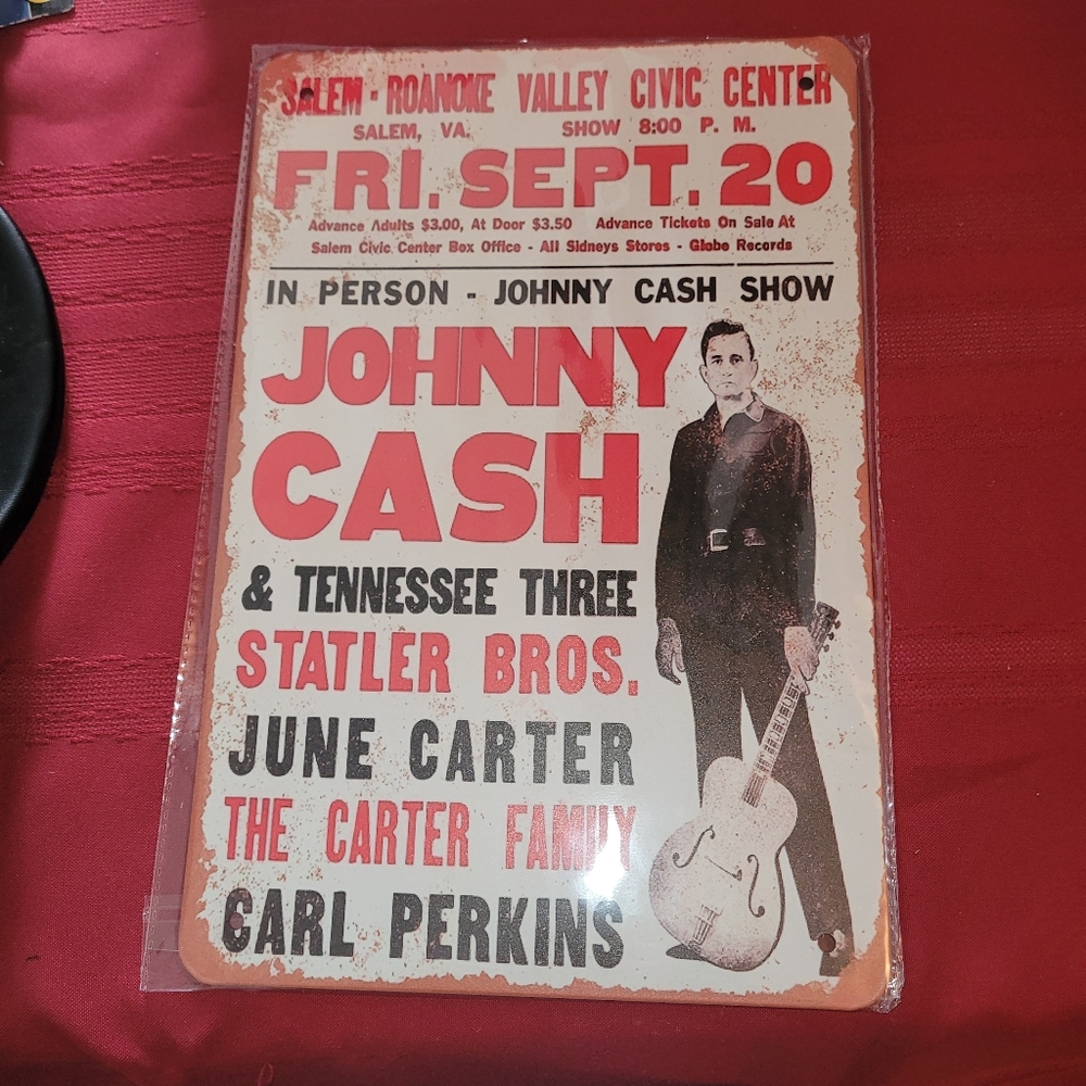 Metal sign with Johnny cash